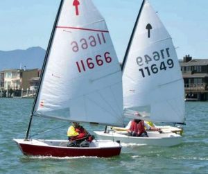 An El Toro Sabot sailing with Gresham marine carbon fiber rudder and centerboard