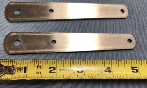 5" Stainless straps or tang for boom or for other purposes where strength is needed. Used to connect a boom to the gooseneck. 1/4" hole at one end and two 3/16" holes on the other. 