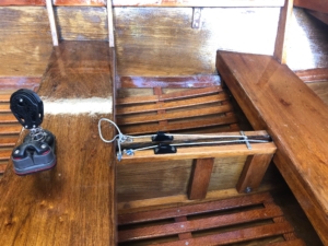 Boat is nearing complete and this shows three coats of varnish and the floorboards reattached to the bottom.