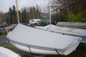 Lido 14 mast up cover. Comes with straps and elastic cord around the bottom to hold it against the hull. Comes in either Sunbrella or Top Gun fabric